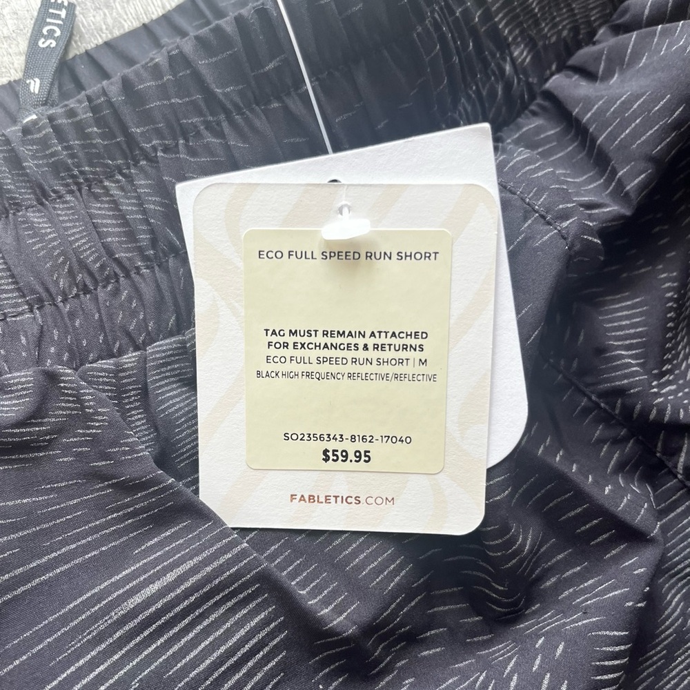NWT Fabletics Eco Full Speed Run Short Black Reflective – Women’s M - Picture 2 of 7